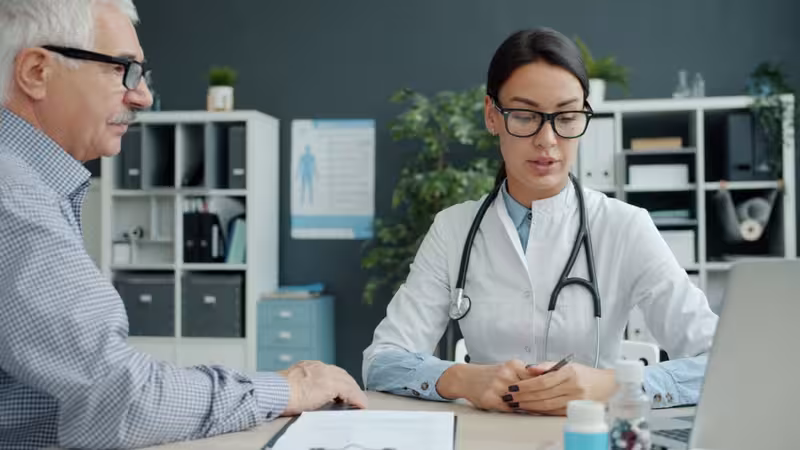 Cambridge Microsuction Booking Guidance for First-Time Patients: A doctor in a clinic Doctor in clinic for Cambridge Microsuction Booking Guidance for First-Time Patients - Cambridge: Private Microsuction Ear W...